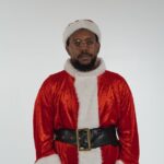 Bild des Weihnachtsmanns mit Wikipedia-Link zur Erfindung des Weihnachtsmanns